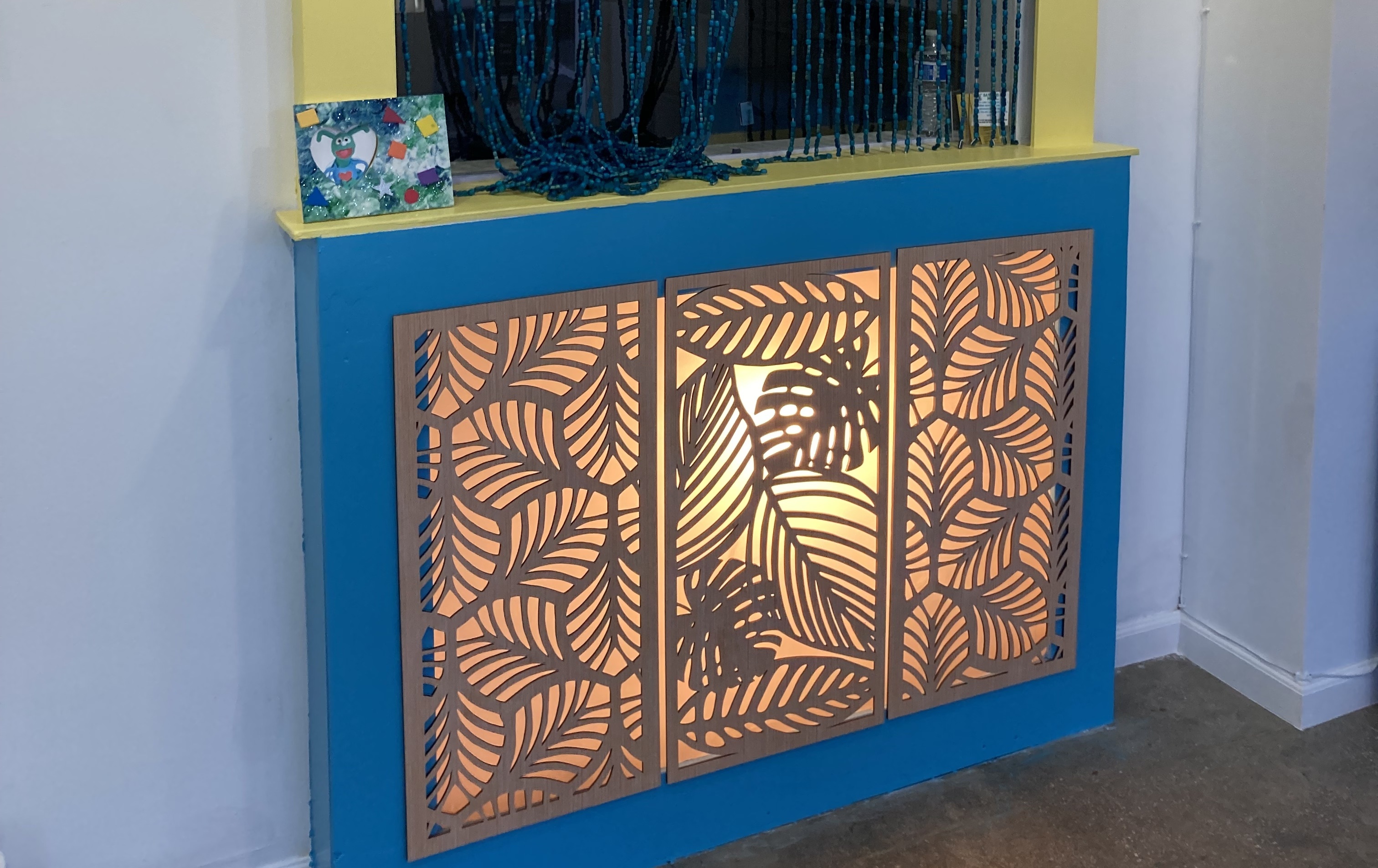 Custom reception desk with built-in lighting and storage solutions