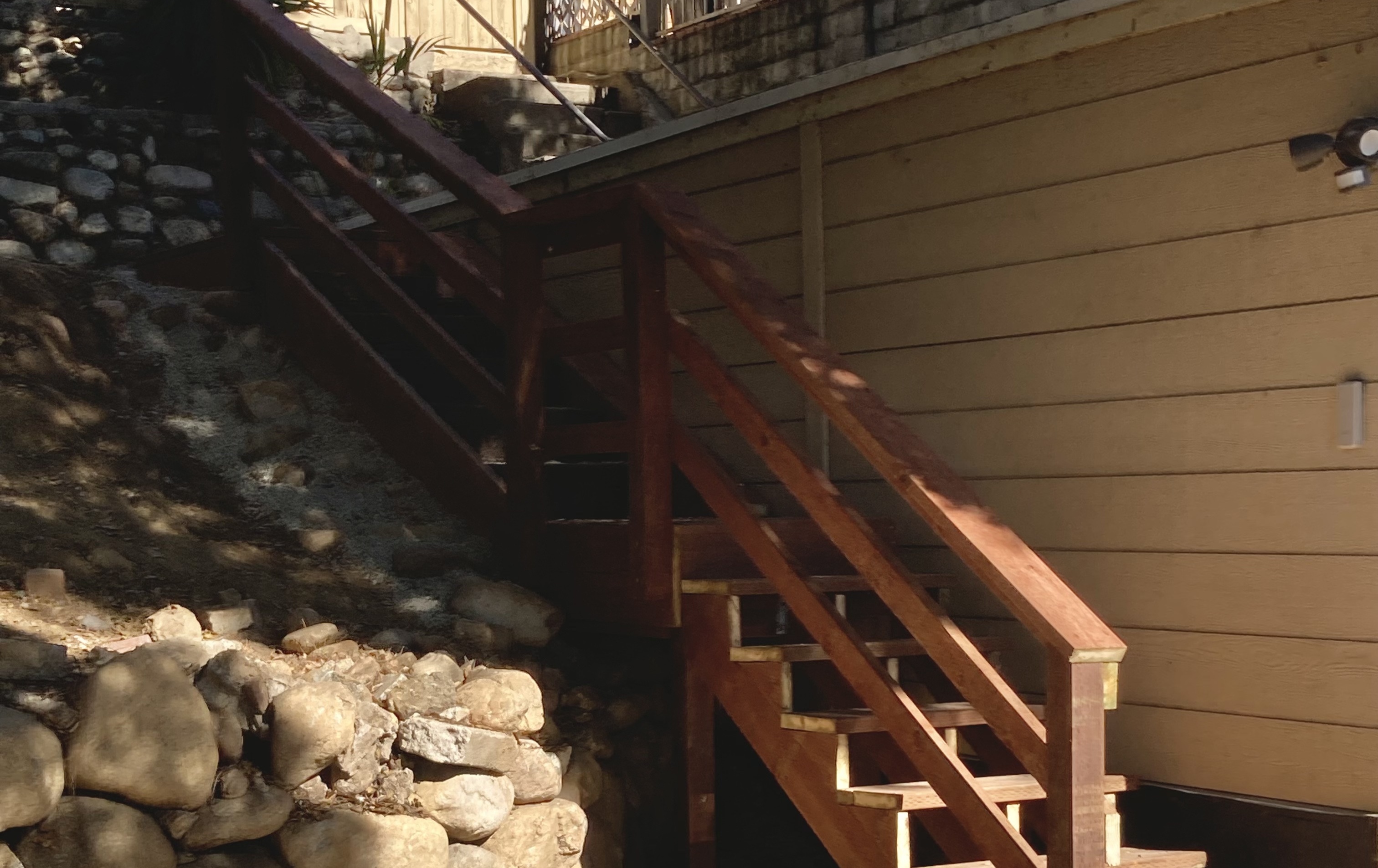 Custom hillside stairs in Highland Park with landscape integration