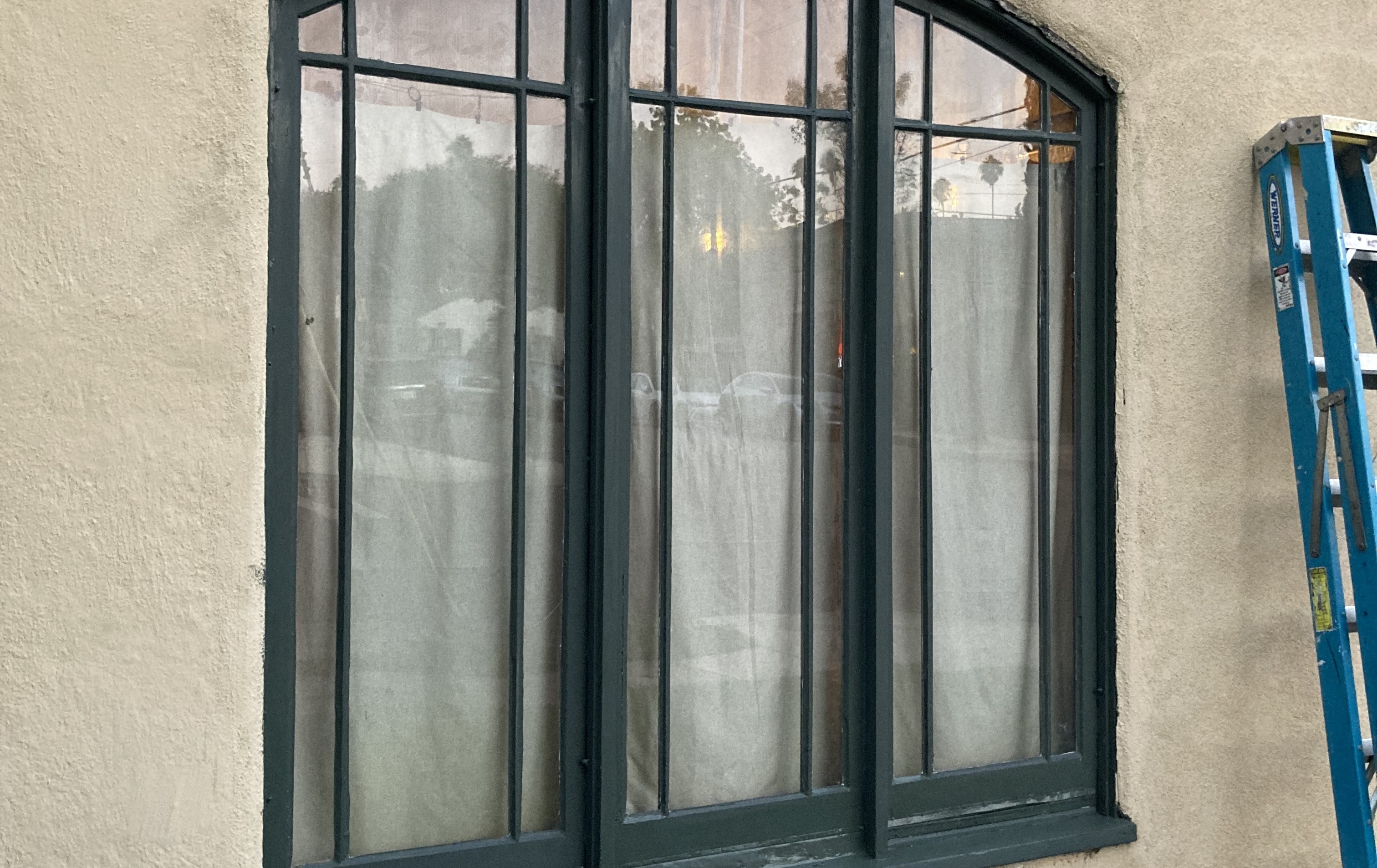Window restoration with new panes and reglazing in Highland Park historic home