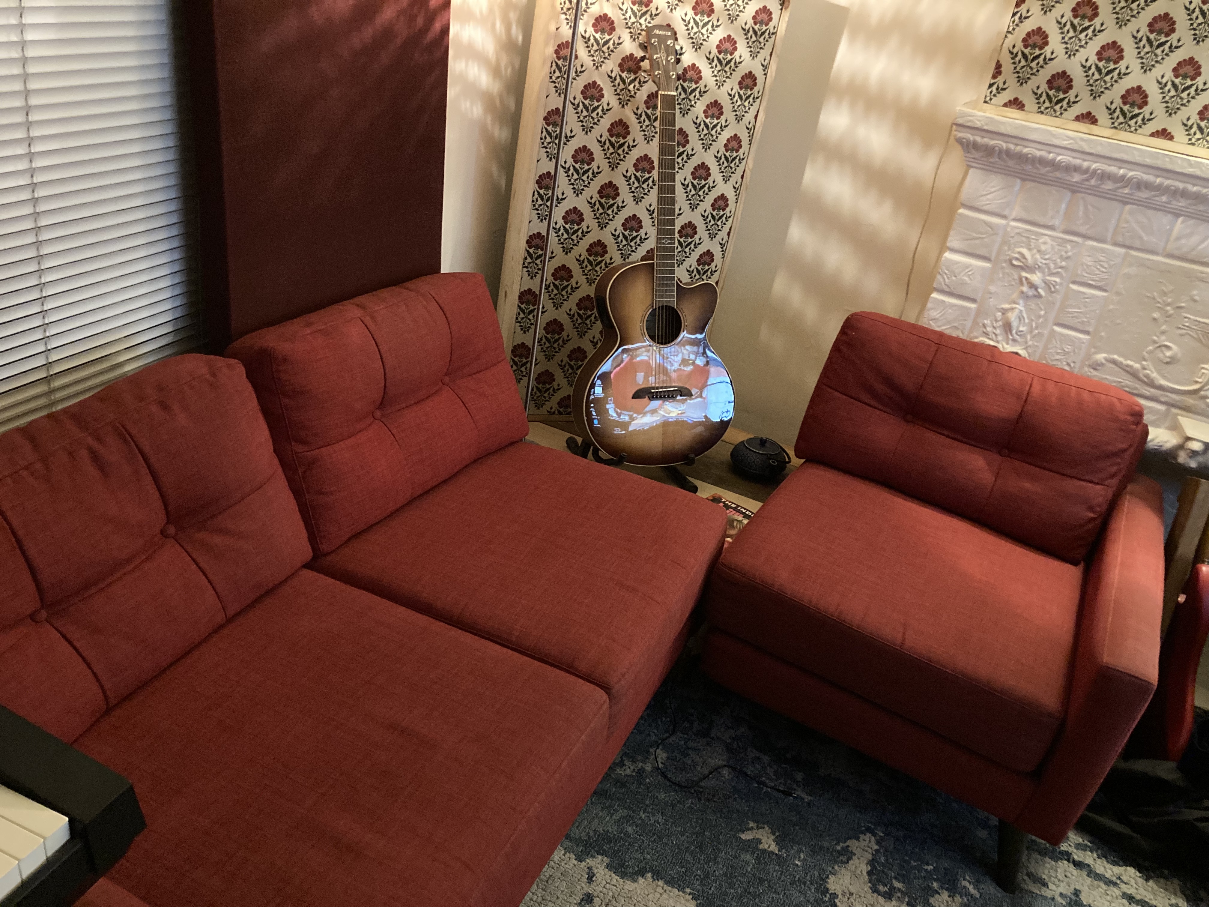 L-shaped red couch custom fabrication