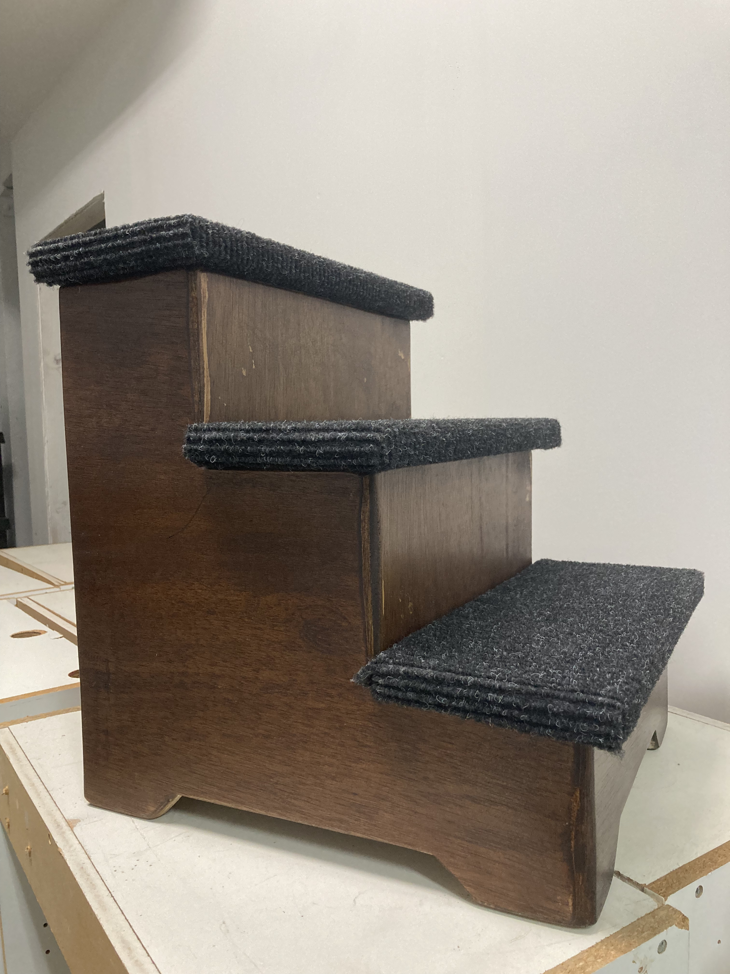 Dog steps with carpet tread and walnut custom fabrication